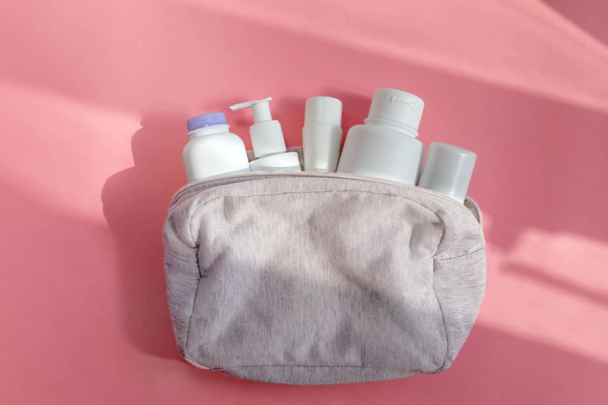 A small bag filled with skin care products
