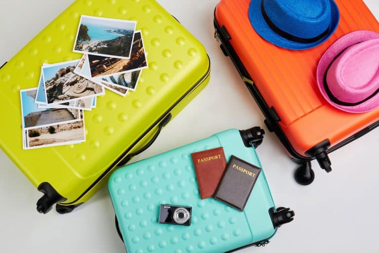 Colorful suitcases for family trip, Luggage and different accessories, How Many Suitcases For A Family Of 4?