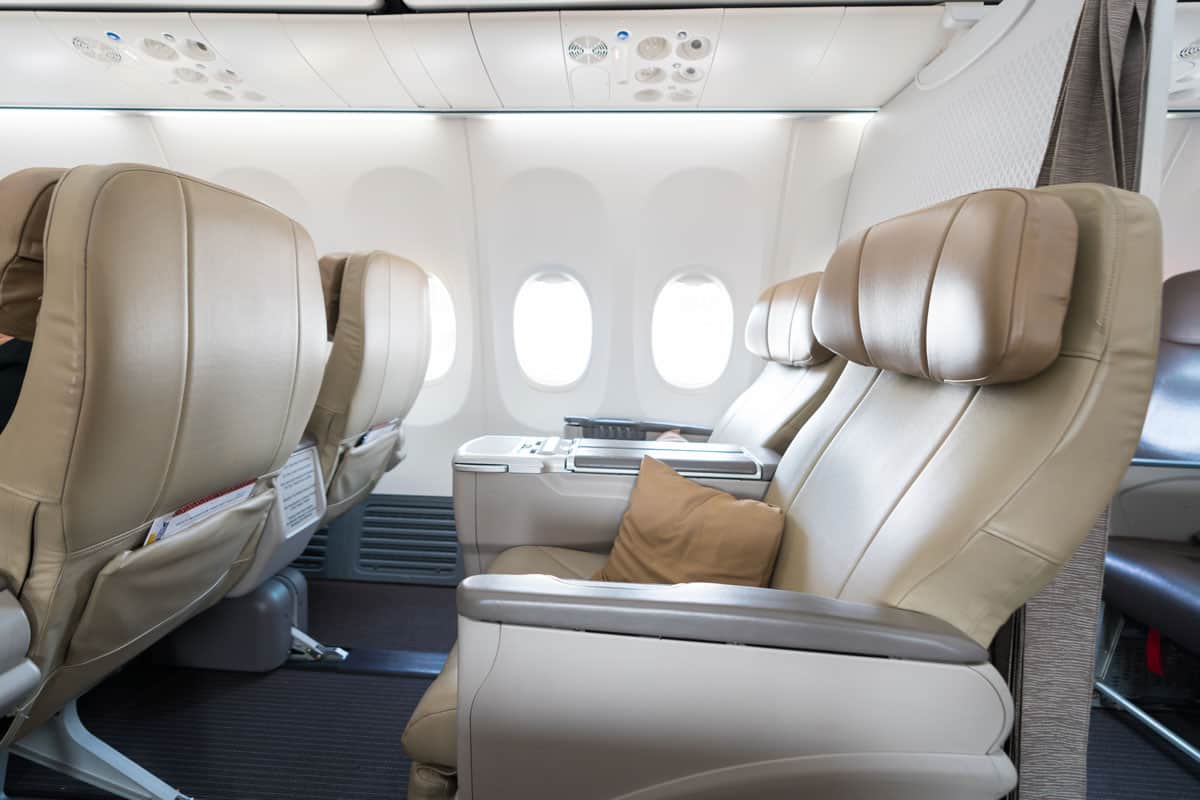 an-elegant-place-inside-a-high-class-airplane-comfortable-light-colored-seats