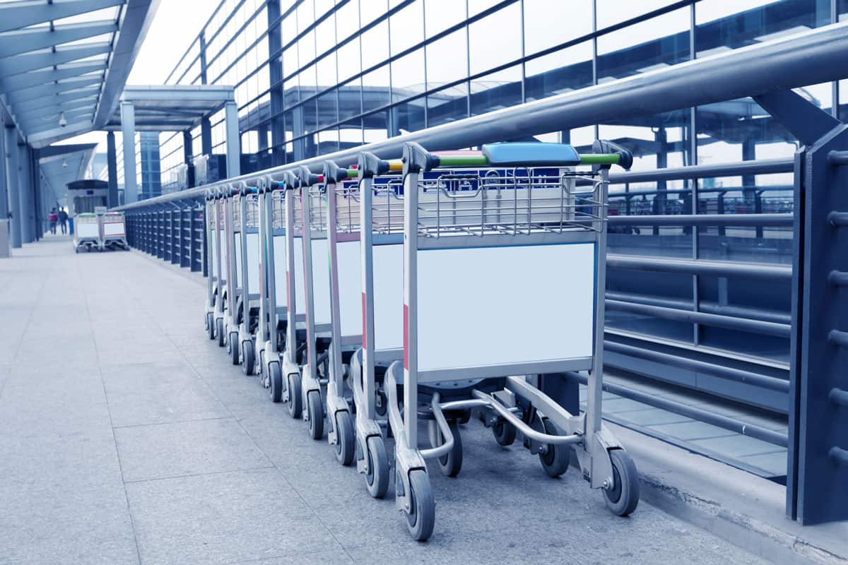well arranged luggage cart on the terminal airport, morning