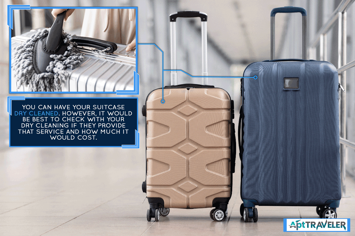 A two stylish suitcases standing in empty airport hall, Can Suitcases Be Dry Cleaned?