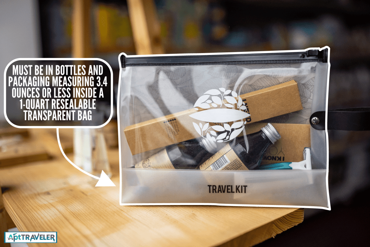 A transparent travel kit on a table, Do My Carry On Liquids Have To Be In A Bag?