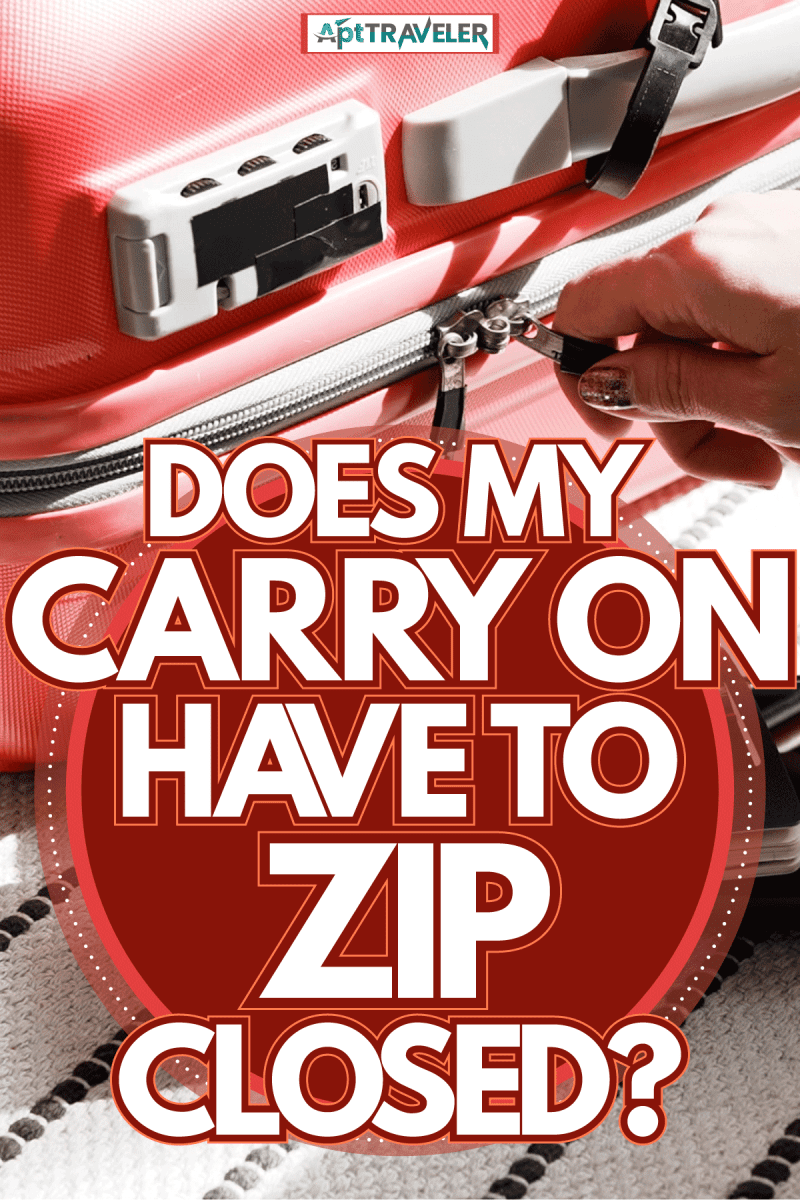 packing-a-bright-red-carry-on-luggage-securely-passports-cards-personal-stuffs, Does My Carry On Have To Zip Closed?