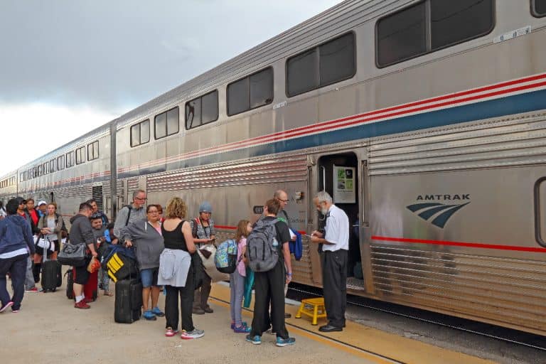 Passengers waiting to present their tickets for boarding the amtrak train, Does Amtrak Search Carry-On Bags?