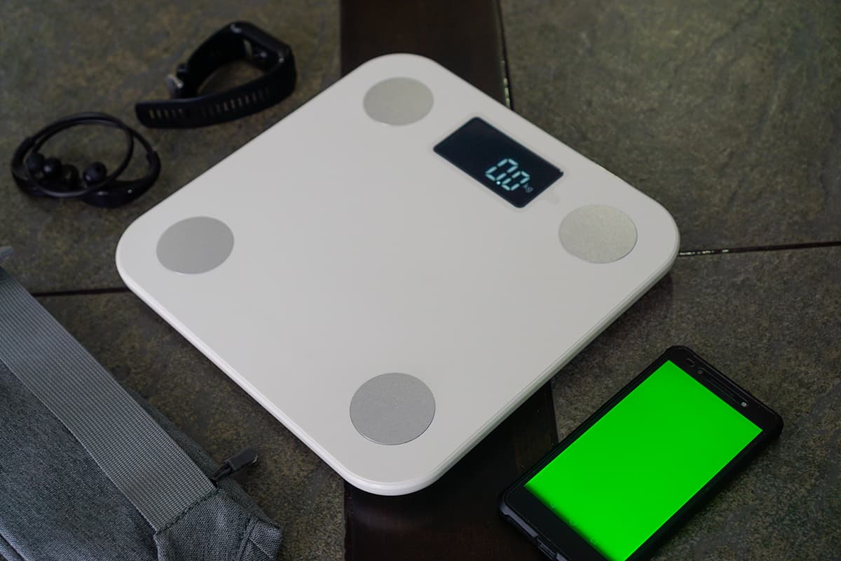 White smart scale with green screen chroma key health application