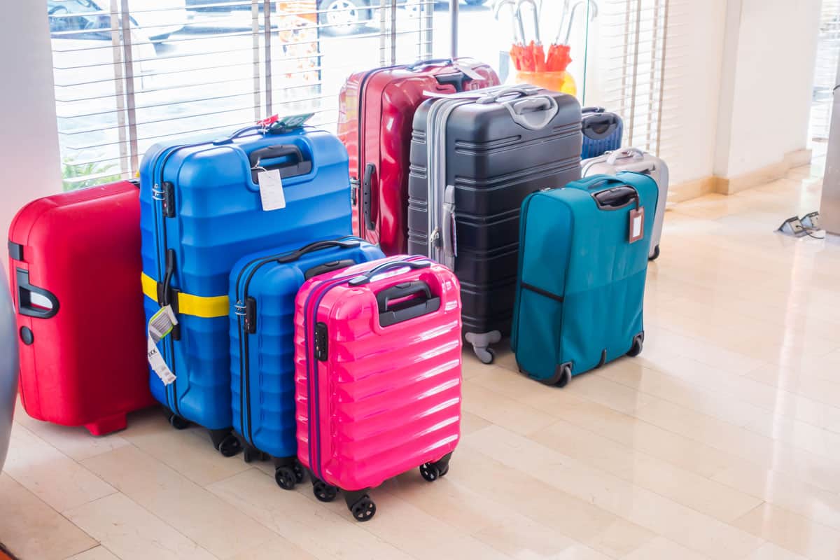 colorful luggage, pink, blue, green, red, grey luggage