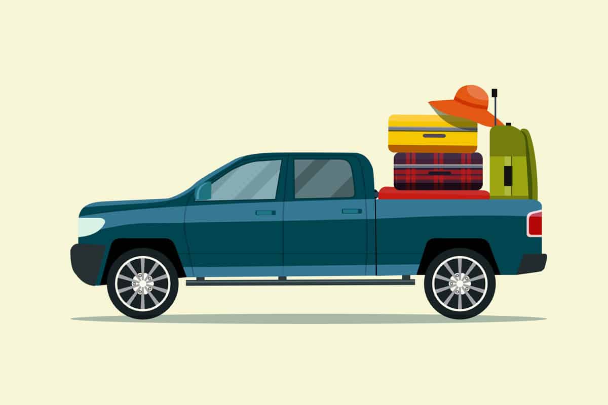 vector of a dark green pick up truck carrying luggage on the truck bed