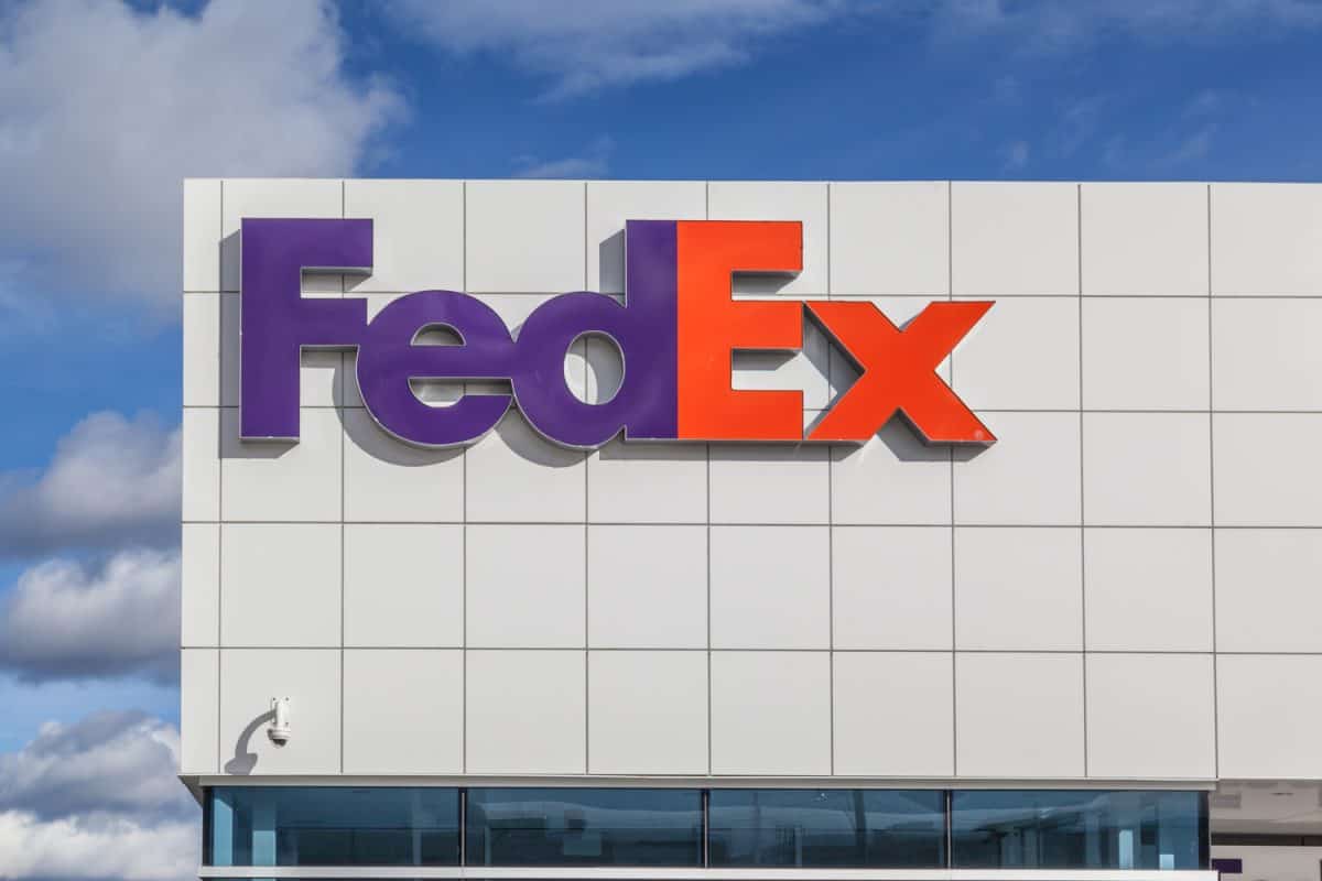 Close up of FedEx sign on the building in Toronto. FedEx Corporation is an American multinational courier delivery services company