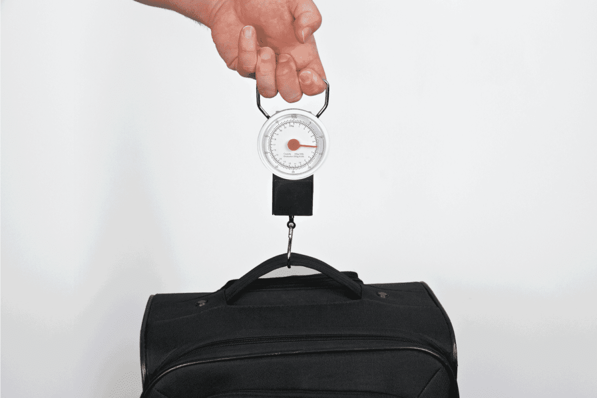 Measuring the weight of a suitcase for airline travel weight limitations