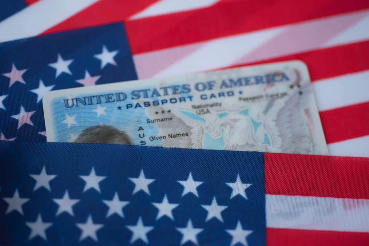 Plastic Passport card of United states of America covered of flag of USA.