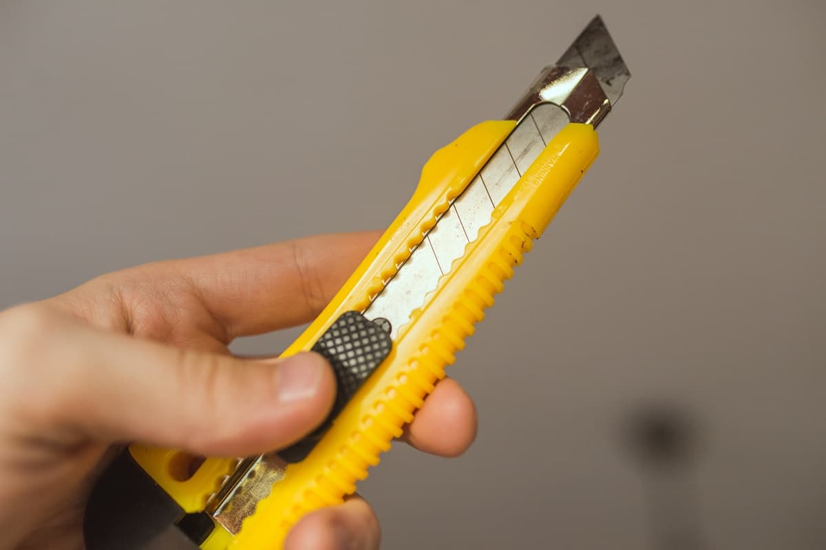 Use a box cutter - box cutter tool yellow