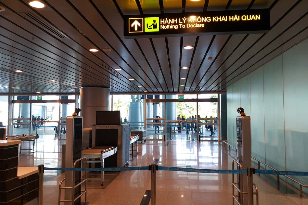  A closing lane of Nothing to declare with a display in English and Vietnamese language in the arrival hall at Da Nang International Airport
