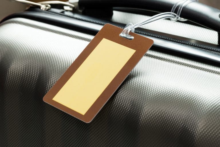 Close up of blank luggage tag on suitcase.jpg - When Does Delta Send Luggage Tags