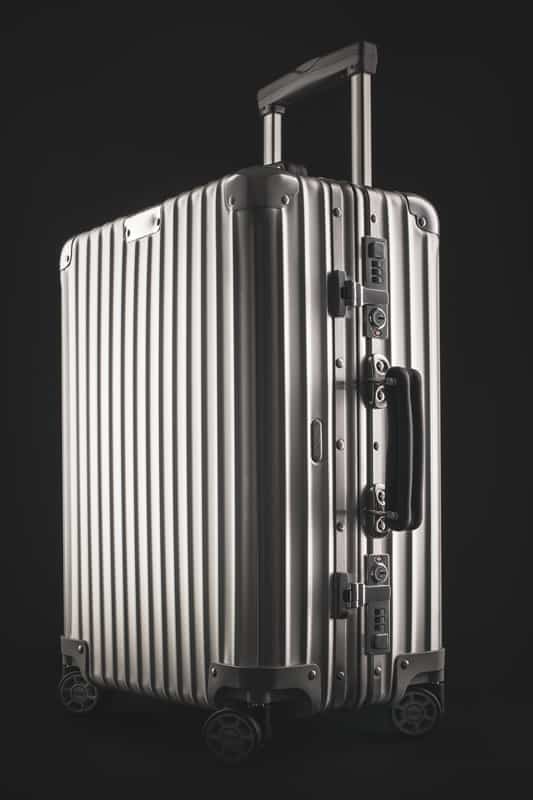 Rimowa traveling luggage bag or business suitcase studio isolated.